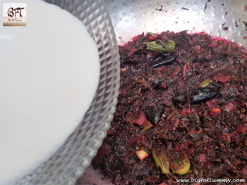 Preparation of Tamde Patol Bhaji (red amaranth in coconut milk)