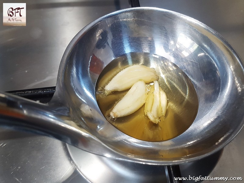 Preparation of Tamde Patol Bhaji (red amaranth in coconut milk)